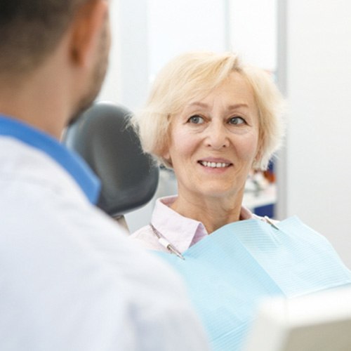 patient talking to dentist