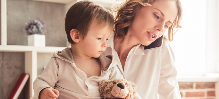 Mother with her toddler and teddy bear