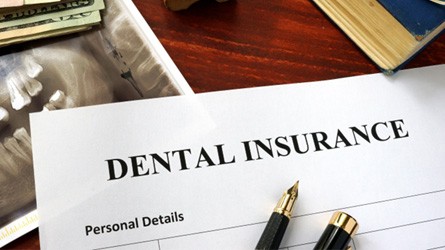 Dental insurance form lying on a table