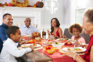 a family enjoying a Thanksgiving meal together